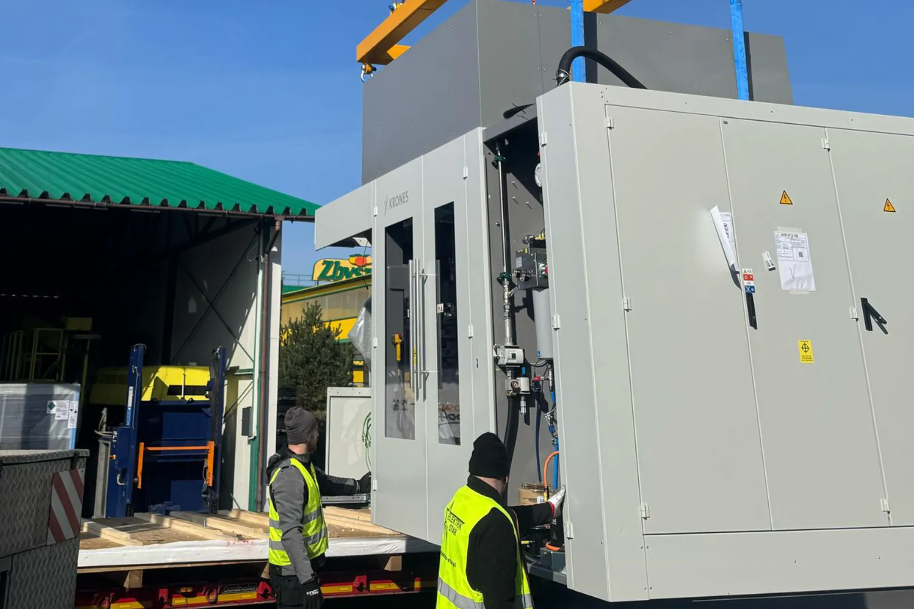 Unloading a finished control cabinet from a truck